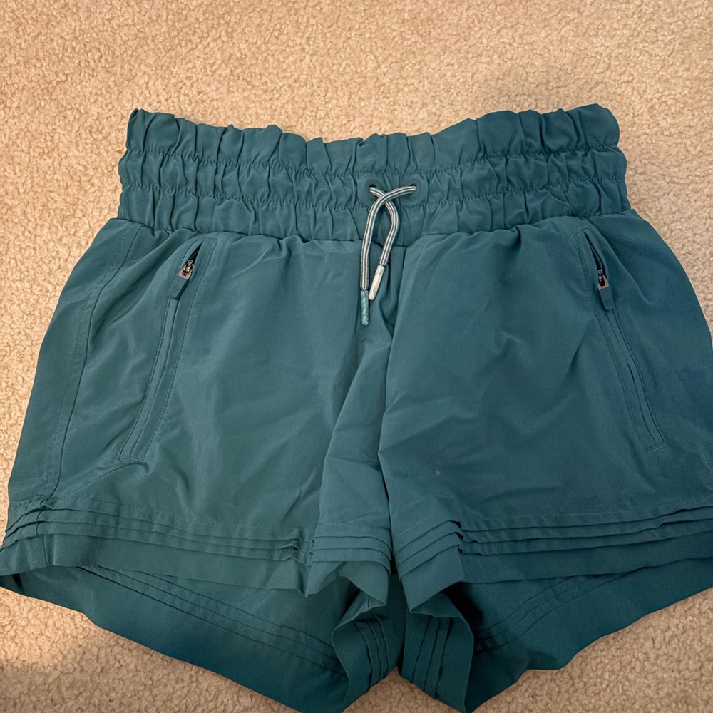 Athleta Girl teal shorts Size XL